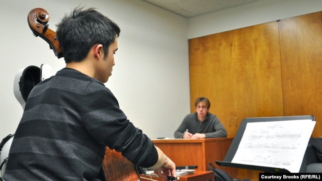 Composer David Fulmer and cellist Jay Campbell rehearse Fulmer's requiem for the victims of the 2011 Zhanaozen massacre in Kazakhstan.