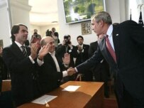 Signatories Jose Maria Aznar (left) and Natan Sharansky were greeted by U.S. President George W. Bush after his speech June 5 (official site)