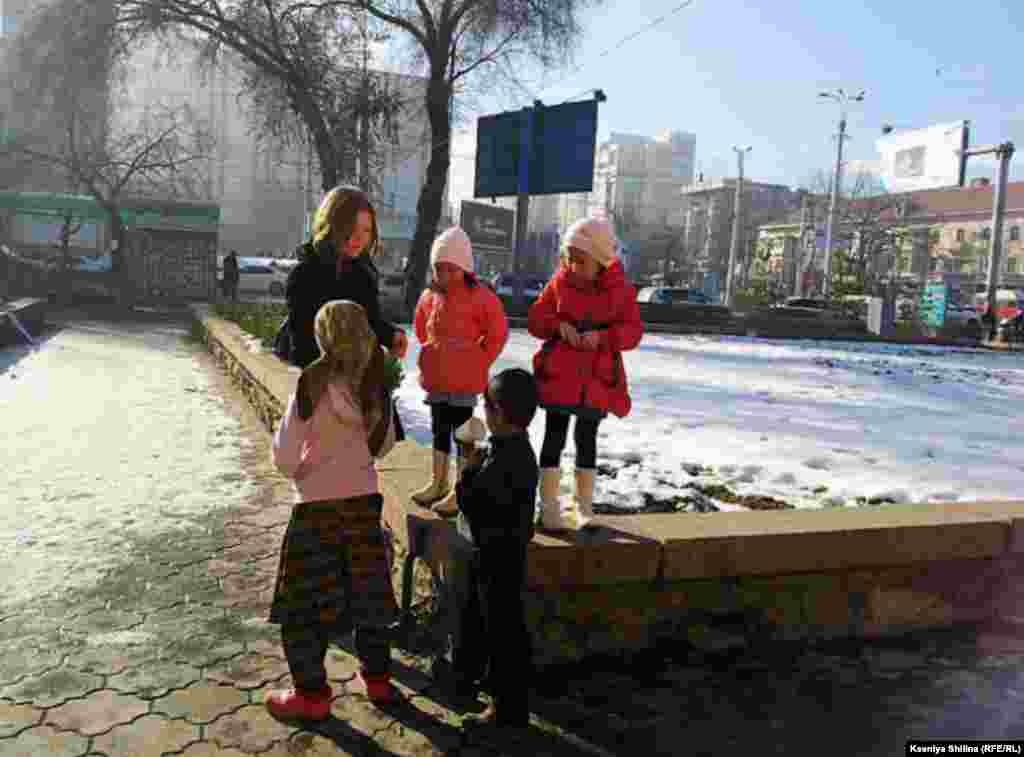 Luli children gather on a corner in Bishkek to beg for spare change.