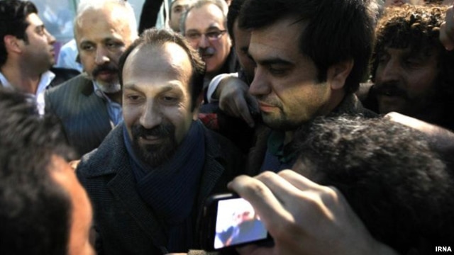Director Asghar Farhadi (center) was mobbed by fans on his arrival at Tehran's airport in early March, two weeks after his Oscar victory.