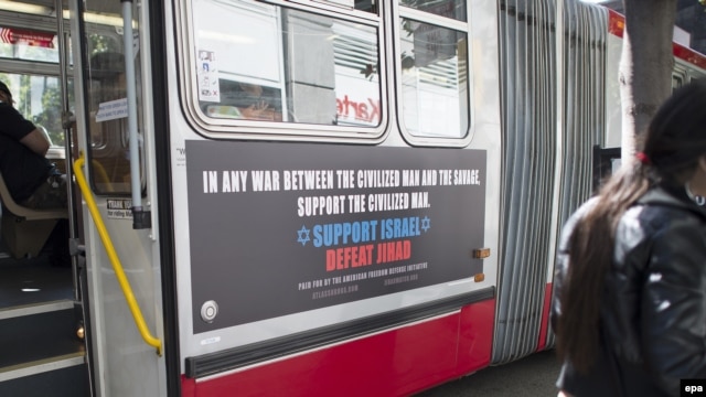 A city bus with a pro-Israel ad from the American Freedom Defense Initiative on it passes through downtown San Francisco.