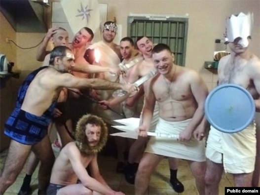 Prisoners don Roman-style togas at Serpukhov jail outside Moscow to celebrate the birthday of crime boss Anton Kuznetsov.