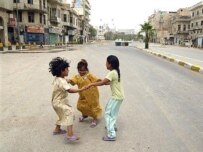Girls in Baghdad take advantage of a quiet moment