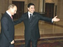 President Berdymukhammedov (right) welcomes Putin to Ashgabat on May 11 (ITAR-TASS)