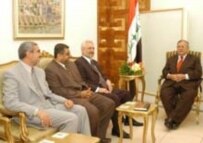 President Talabani meeting with UIA members recently (RFE/RL)