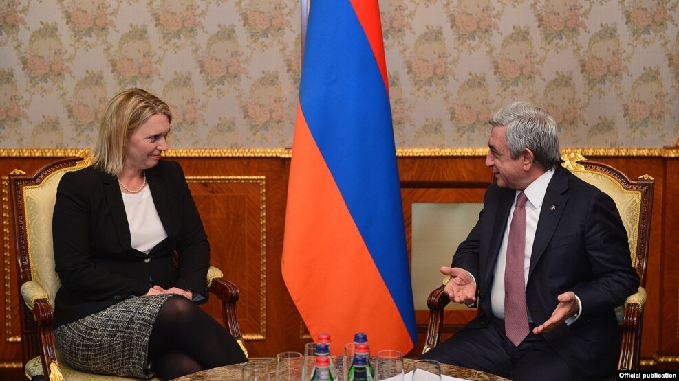Armenian President Serzh Sarkisian (right) meets with Bridget Brink, the U.S. deputy assistant secretary of state for European and Eurasian affairs, in Yerevan on November 16.