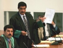Khamis al-Ubaydi addresses the court in Baghdad in October 2005 (epa)