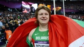 Nadzeya Astapchuk celebrates after winning the women's shot-put final at the London Olympic Games.