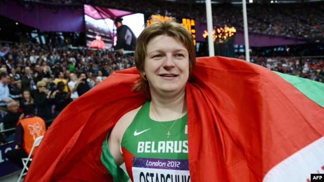Nadzeya Astapchuk celebrates after winning the women's shot-put final at the London Olympic Games.