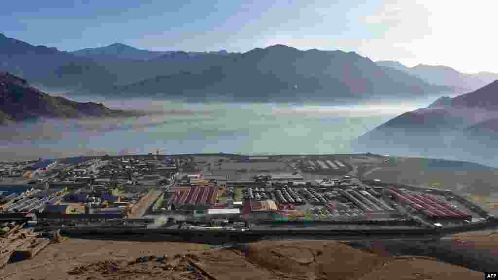 An aerial view of the French military's Camp Nijrab in Afghanistan's Kapisa Province. France ended its combat mission in Afghanistan on November 20, withdrawing troops from the strategic province northeast of Kabul as part of a quickened departure from the war-torn country. Paris says all French combat soldiers will leave the country next month, two years before allied nations contributing to the 100,000-strong International Security Assistance Force are due to depart. (AFP/Joris Fioriti)