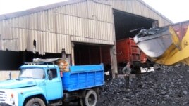 Loading coal in Kazakhstan's Daulet village 