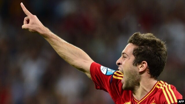 Spain's Jordi Alba celebrates after scoring a goal against Italy in the first half of the Euro 2012 final in Kyiv.