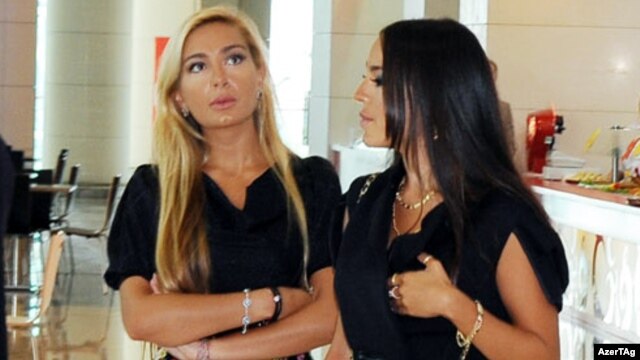 Ilham Aliyev's daughters, Arzu (left) and Leyla, are listed as senior managers at the Panamanian-registered companies.
