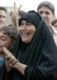 Iraqis celebrate the death sentence handed down to their former leader, Saddam Hussein (epa)