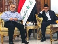 Vice President al-Hashimi (left) and Accordance Front leader Adnan al-Dulaymi today in Baghdad (AFP)