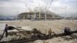 The construction of facilities for the 2014 Winter Olympics in Sochi, such as Olympic Stadium, has been dogged by huge cost overruns. (file photo)