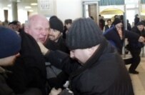 Kazulin (left) tussles with police at an opposition demonstration in Minsk on March 2 (AFP)