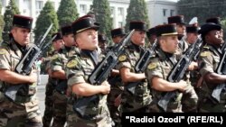 French and Tajik soldiers participate in a parade in Dushanbe in 2011.
