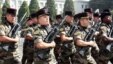 French and Tajik soldiers participate in a parade in Dushanbe in 2011.