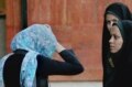 Police and Basij activists check women for proper dress in Tehran on April 22 (Fars)