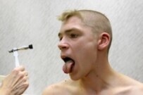 A Russian conscript undergoing a medical examination in 2005 (TASS)