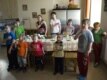 Children pray before dinner.