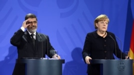Angela Merkel dhe Muhammad Morsi 