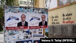 Campaign posters line streets, as the first early parliamentary elections begin in Kosovo.