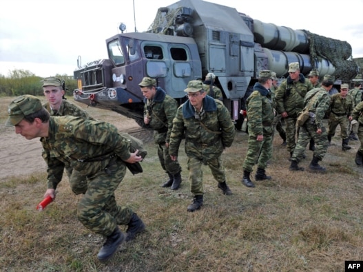 Soldiers near an S-300 surface-to-air missile complex during joint  Russian-Belarusian military exercises in September 2009