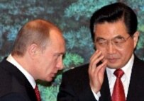 Putin (left) and Chinese President Hu in Beijing on March 21 (epa)