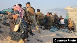 جنود ومقاتلون من أبناء العشائر في عامرية الفلوجة