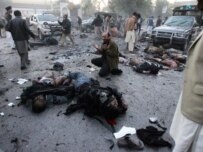 Aftermath of the blast that struck Bhutto's car in Rawalpindi (AFP)