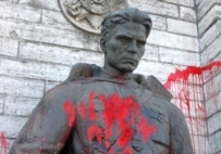 The Bronze Soldier, here vandalized in 2005, was moved from the city center to a cemetery (ITAR-TASS)