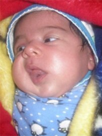 A Tajik baby in Dushanbe today (RFE/RL)
