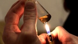 A man prepares a heroin injection at a flat in Tver, Russia. (file photo)