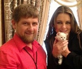 Kadyrov and Hurley pose with a kitten on Kadyrov's Instagram account.