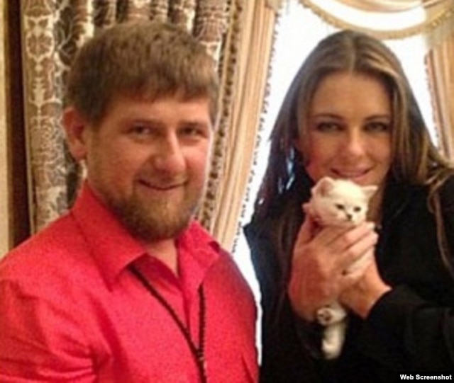 Kadyrov and Hurley pose with a kitten on Kadyrov's Instagram account.