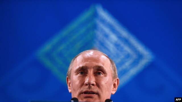 Russian President Vladimir Putin speaks during a press conference at the end of the G20 summit  in Los Cabos, Mexico, on June 19.
