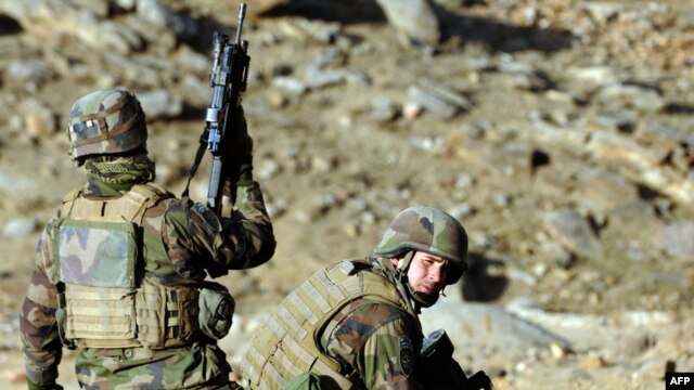 French soldiers take up positions during an operation in Afghanistan's Uzbin Valley. France has 4,000 troops in Afghanistan.