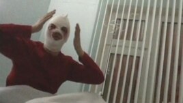 Sergei Filin gestures during an interview in a still image from footage shot by REN TV in a Moscow hospital on January 18.