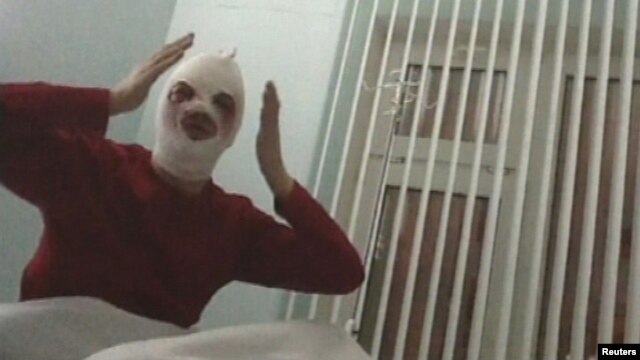 Sergei Filin gestures during an interview in a still image from footage shot by REN TV in a Moscow hospital on January 18.