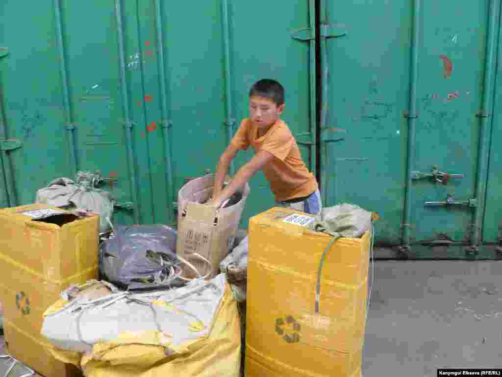 A boy works at a market in the Kyrgyz capital, Bishkek.