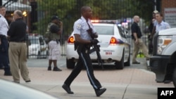 A police officer responding to a September 16 armed attack at a U.S. Navy office in Washington, D.C.
