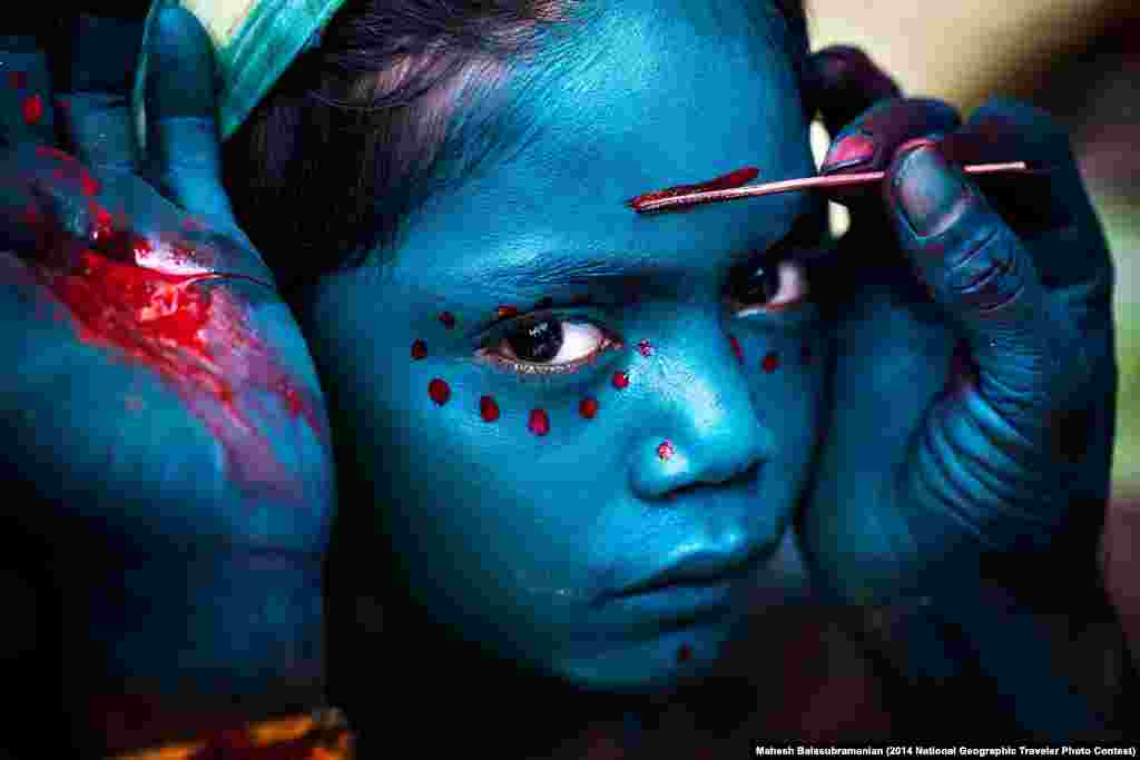 "Divine Makeover" by Mahesh Balasubramanian. Kaveripattinam, Tamilnadu, India. "Taken during "The Mayana Soora Thiruvizha" festival takes place every March in the small village of Kaveripattinam, the day after Mahashivarathiri (The great night of Shiva). The festival is devoted to Angalamman, a fierce guardian deity worshipped widely in Southern India."