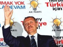 Prime Minister Recep Tayyip Erdogan greets supporters in Ankara on July 22 (epa)