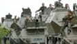 Georgia -- Georgian troops on armored personnel carriers during the conflict with separatist South Ossetian troops at an unnamed location near Tskhinvali, 08Aug2008
