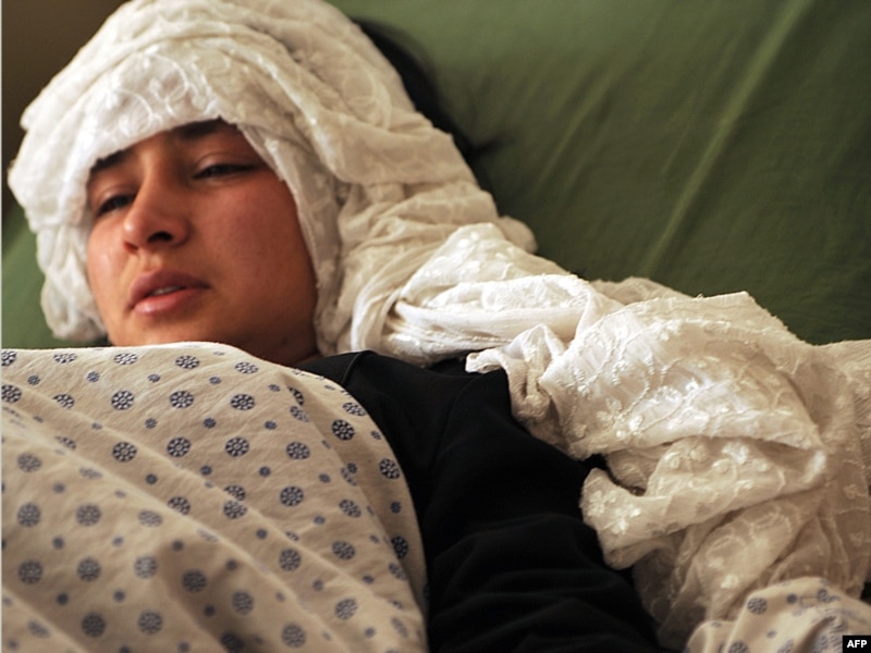 afghanistan kabul girls. An Afghan schoolgirl lies in a