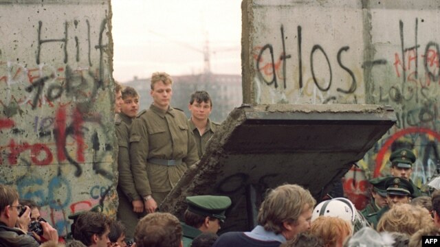 The Berlin Wall came down almost one year before reunification.