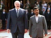 Lukashenka (left) and Ahmadinejad meeting today in Minsk (AFP)