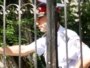 Kazakhstan - Police officer stands outside the gate of Almaly region police station. Almaty, 26Aug2010.